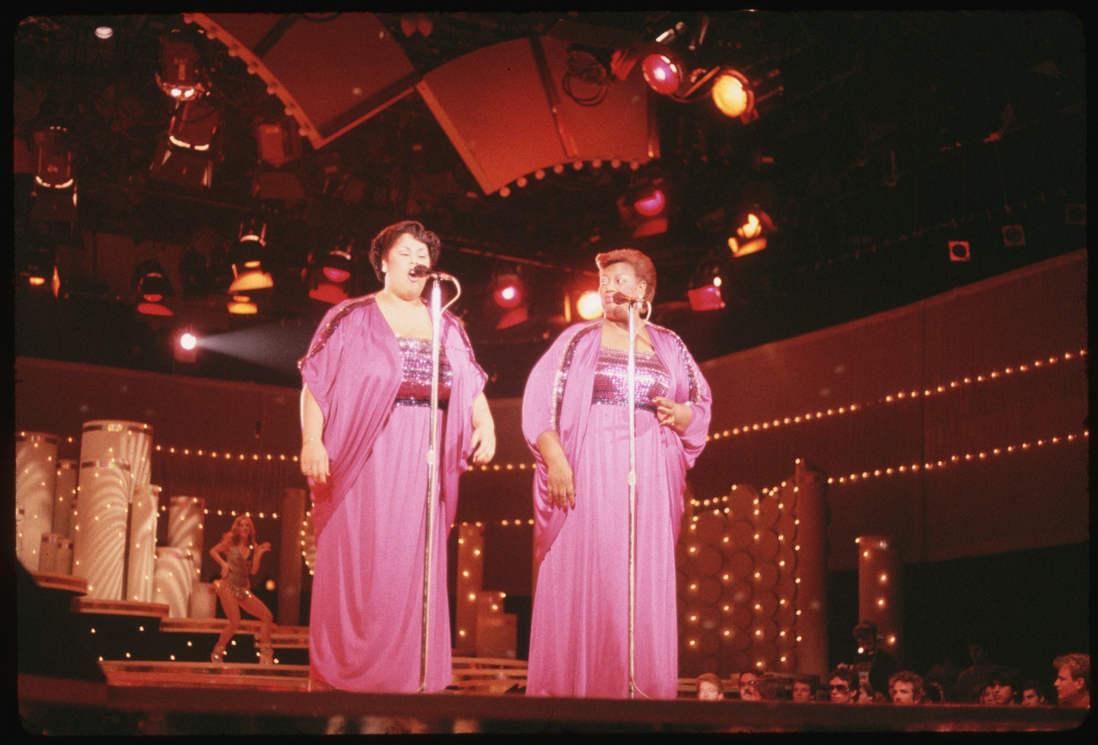 Martha Wash and Izora Rhodes Armstead, redubbed as the Weather Girls, in concert. Photo via LGI Stock/Corbis/VCG via Getty Images.